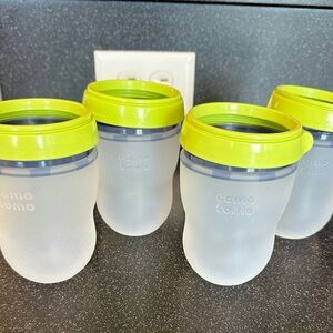 4 Como Tomo bottles, 8 ounces.